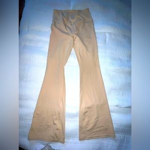 Tan bellbottom yoga pants